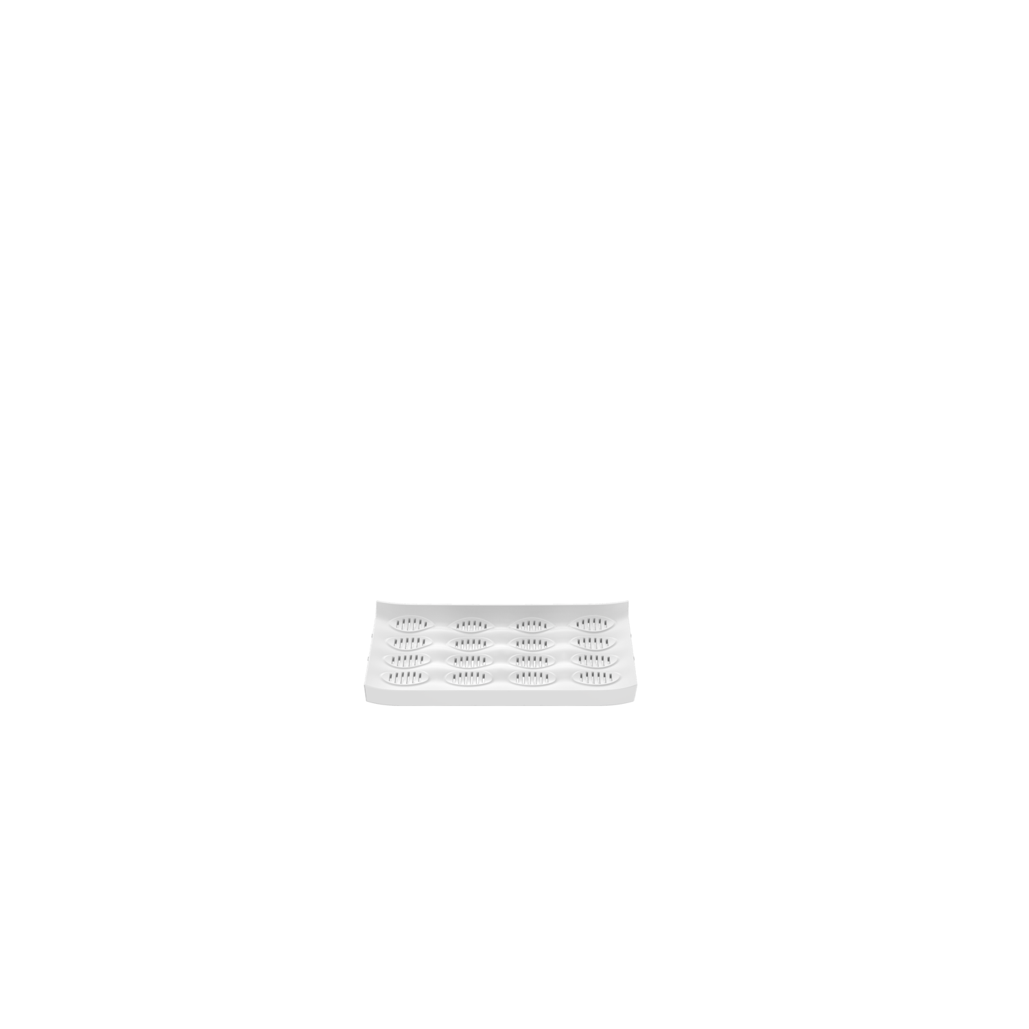 White tray with multiple small compartments against black background.