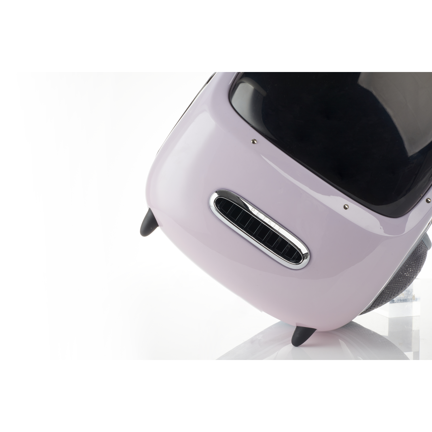 A light purple travel suitcase with a black top and silver accents, angled on a white surface.