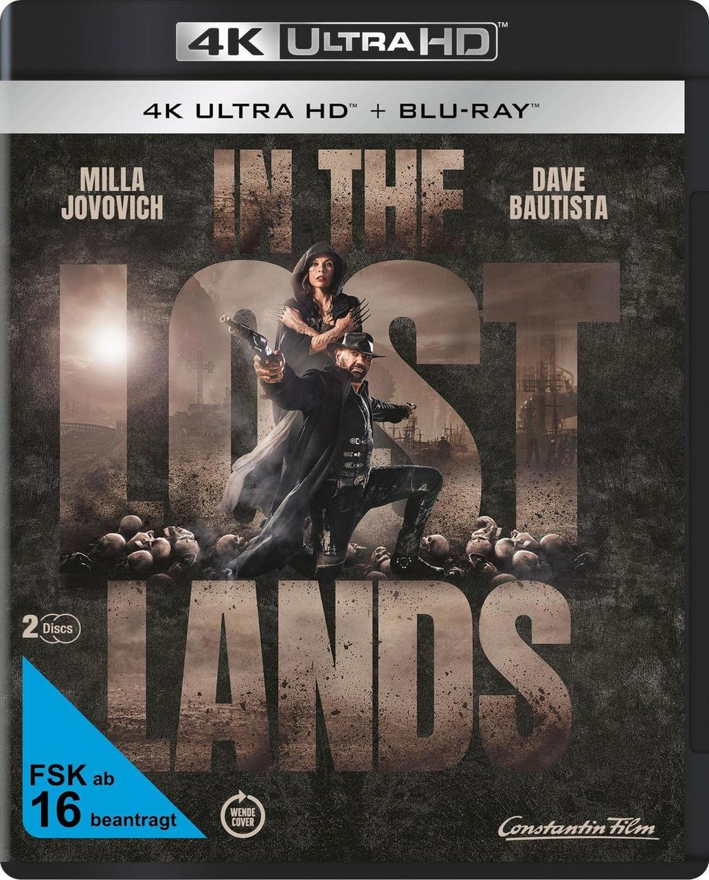 Filmcover: Ein Mann und eine Frau stehen auf einem Friedhof. Der Titel 'In the Lost Lands' ist prominent.