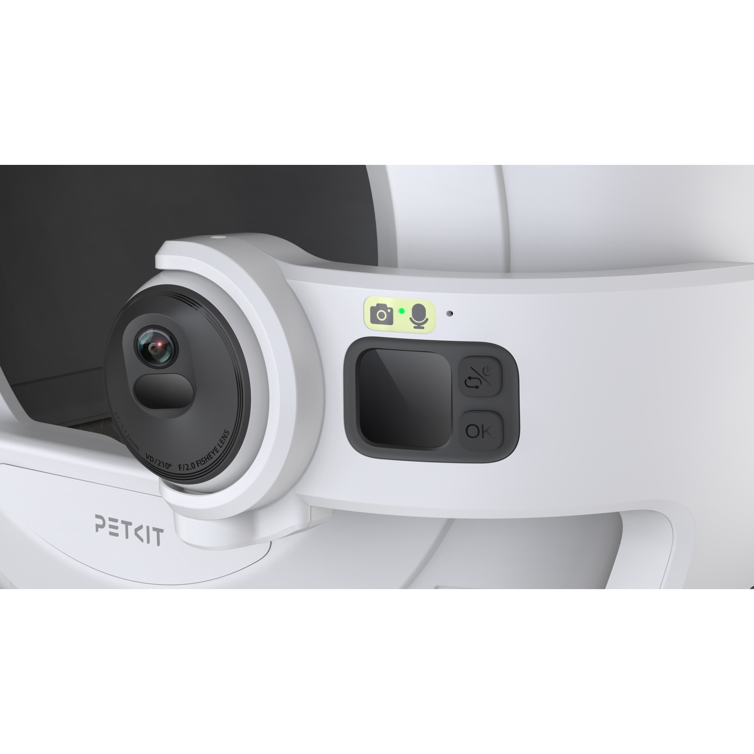 Close-up of a pet camera with a lens, buttons, and a green light.