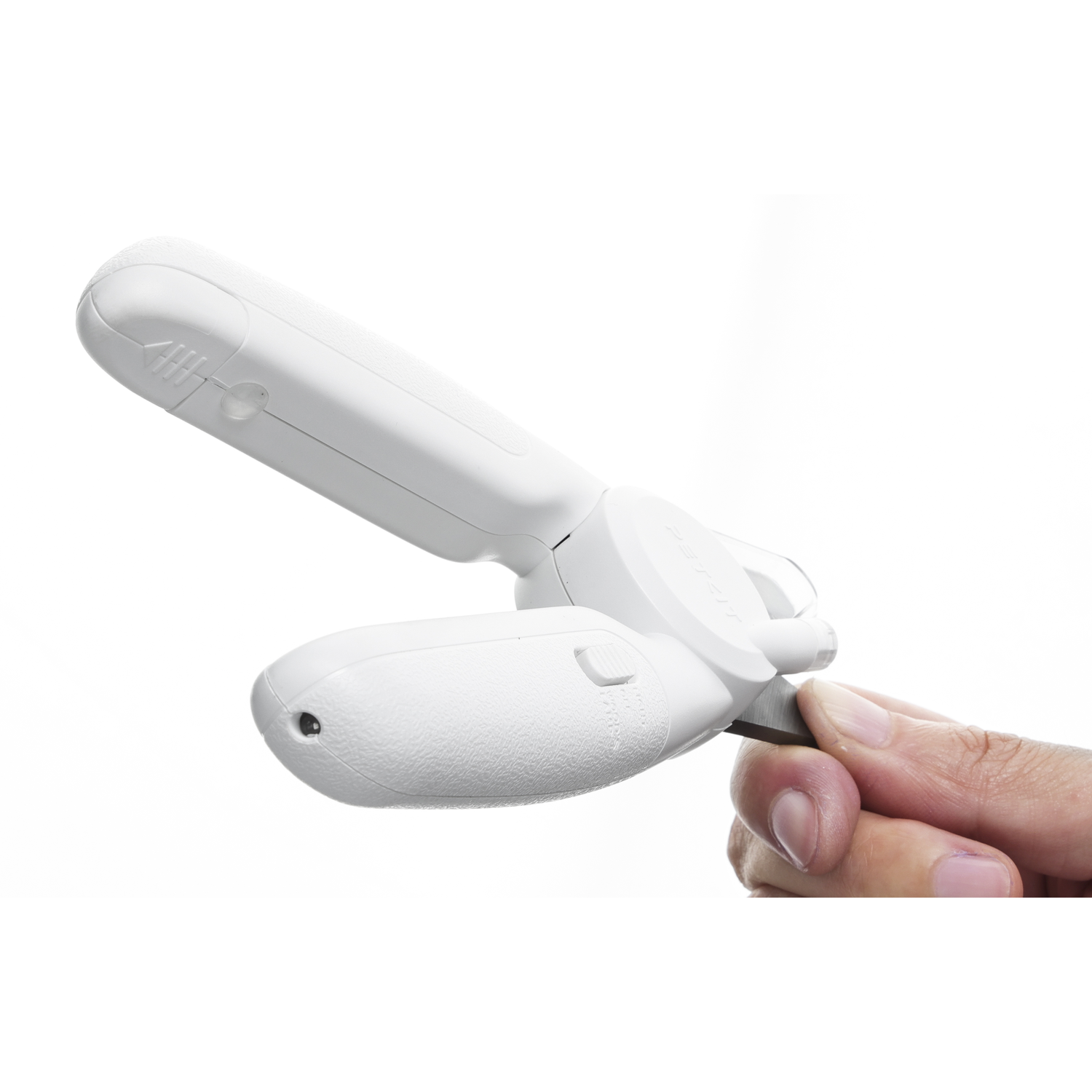 A white tool held by a hand, against a plain white background, angled to the left.