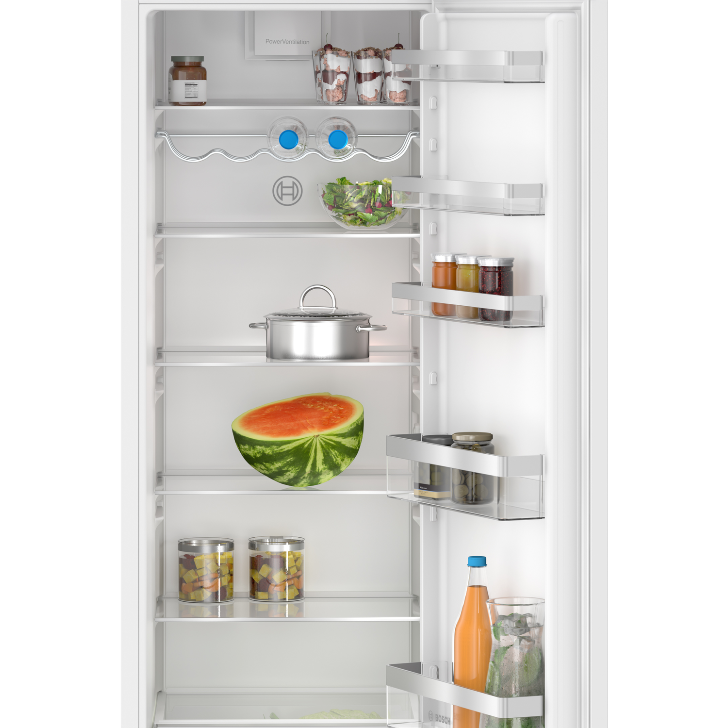 An open refrigerator interior with food items on shelves, including a watermelon.