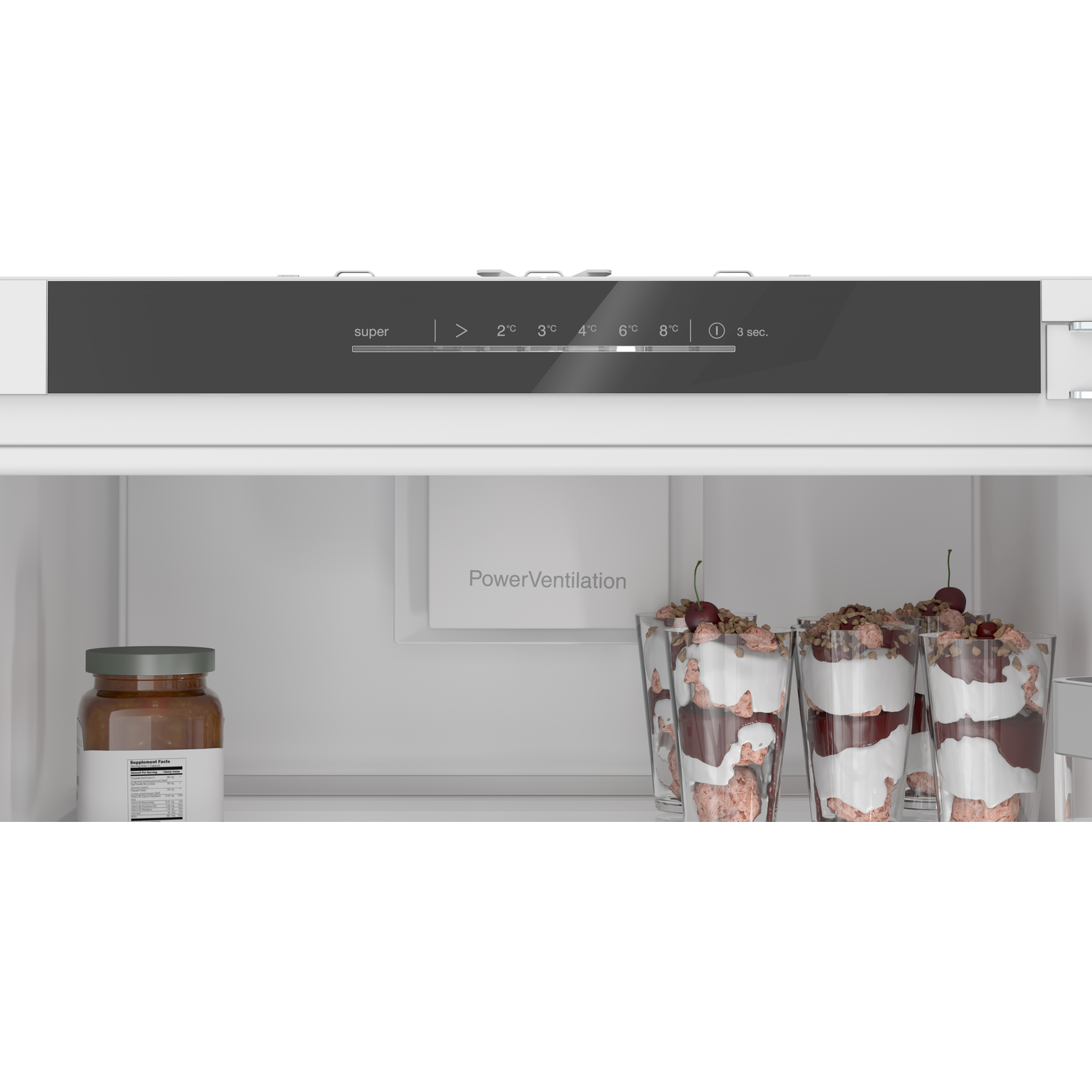 Inside of refrigerator showing control panel and food.