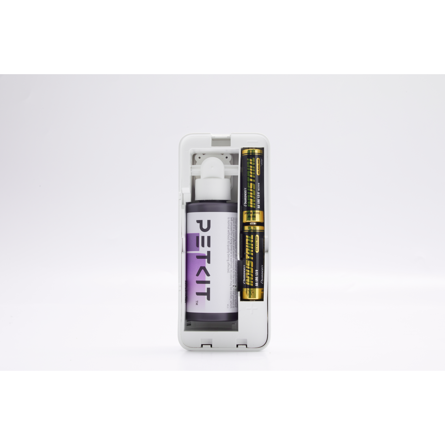 A PETKIT product with batteries and a spray bottle in a white holder.