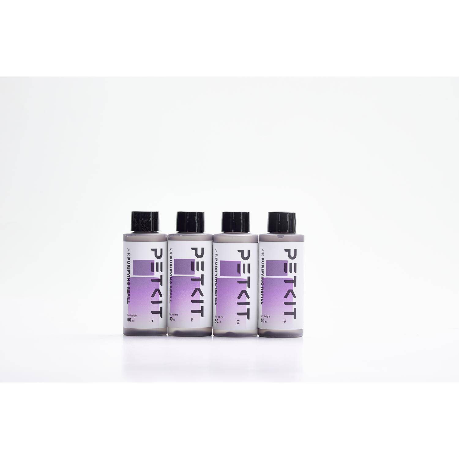 Four small PETKIT air purifying refills in a row, black caps, and a white background.