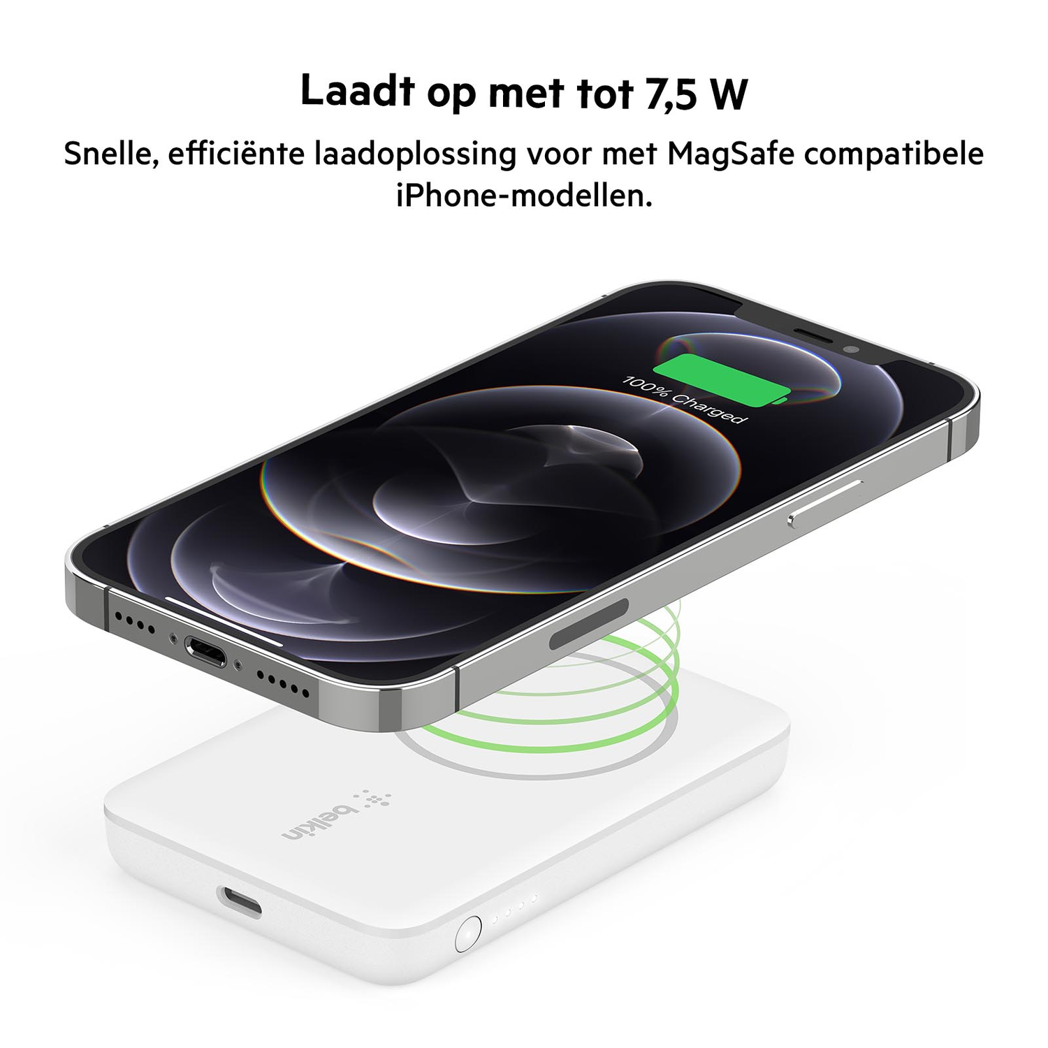 A black iPhone is charging wirelessly on a white charging pad, with a charging indicator.