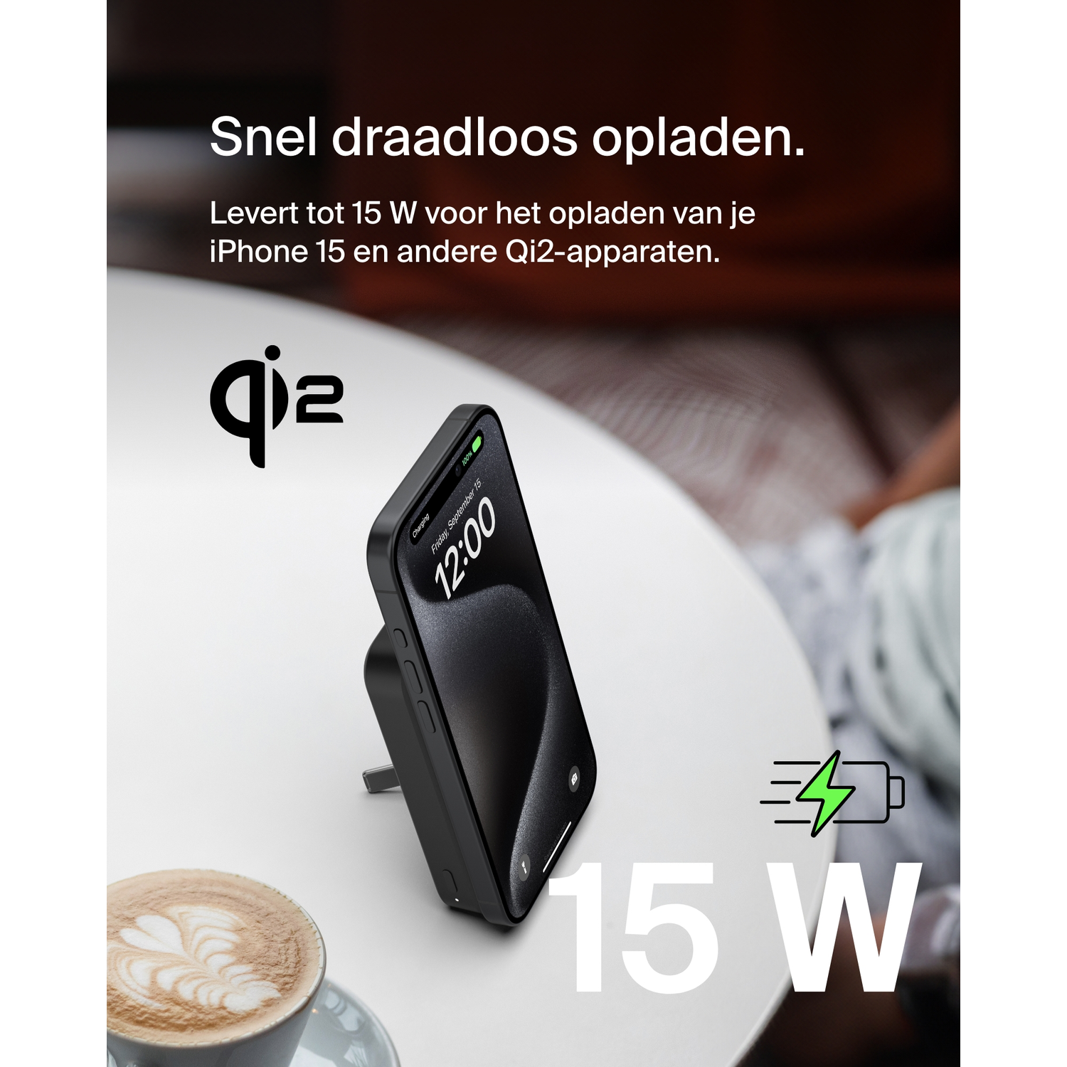 Wireless charger with a phone charging on it, and text.
