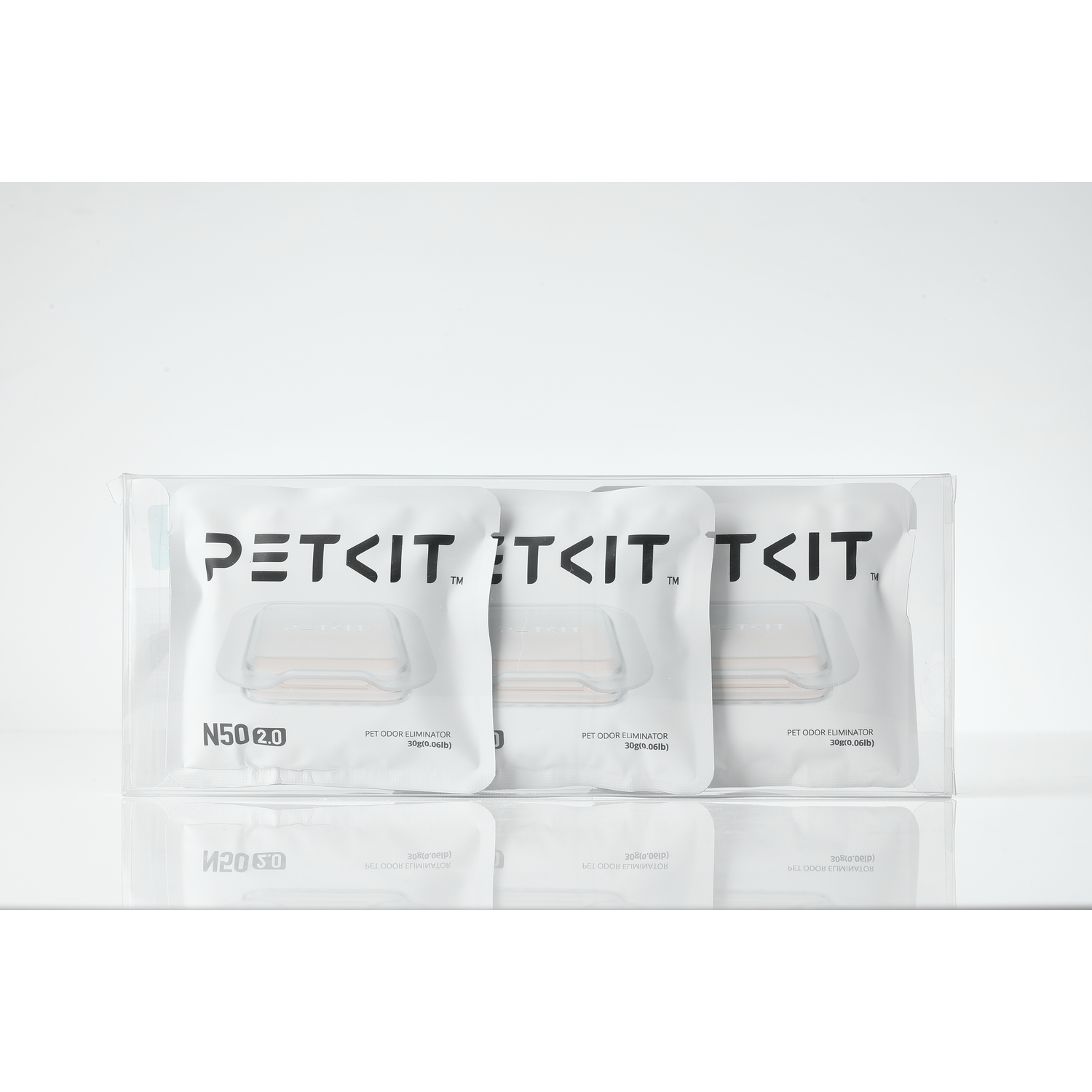 PetKit odor eliminator packets. Three white packets in a clear box, labeled with text.