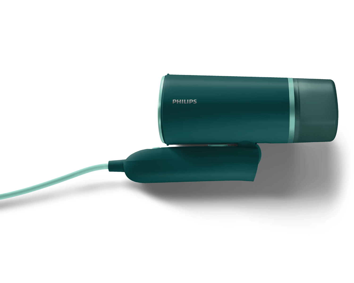 Una cámara web de color verde azulado, con un cable, está sobre una superficie blanca.