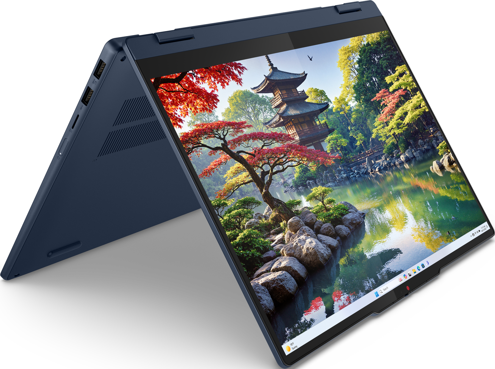 Blauer Laptop, geöffnet, zeigt eine japanische Gartenszene mit Stift.