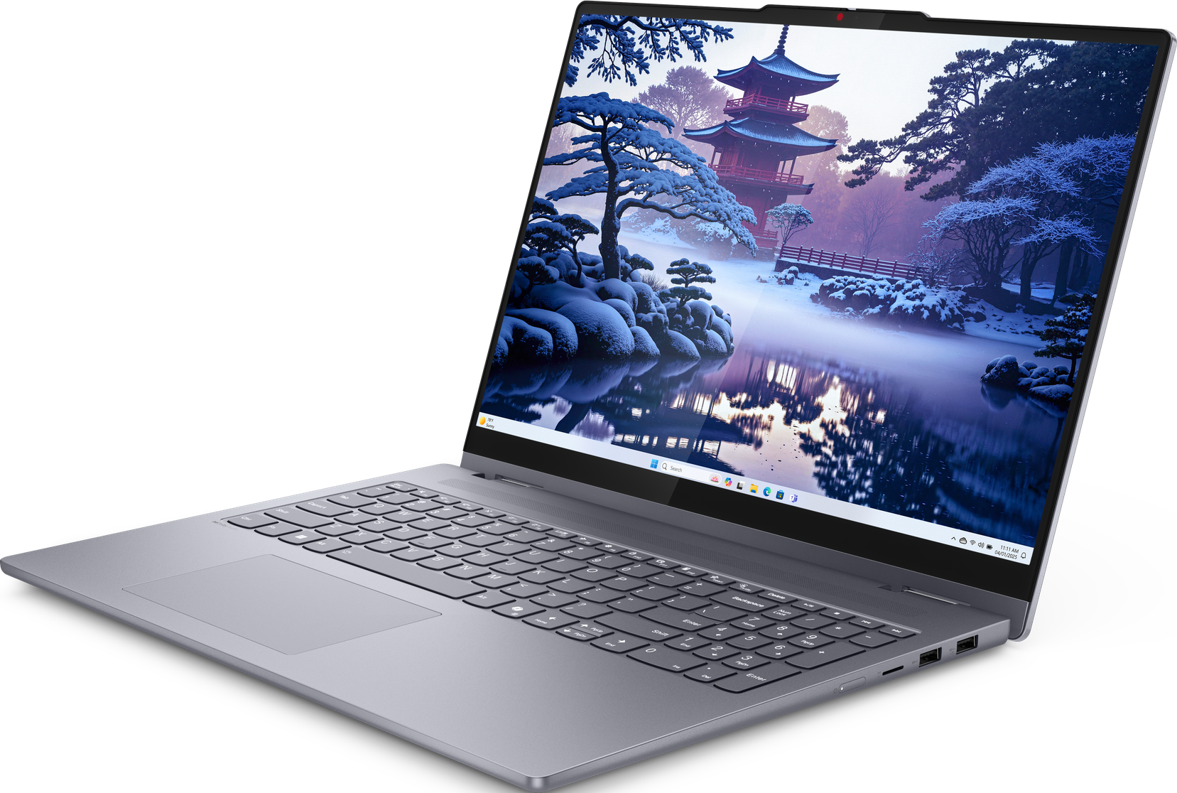 Un laptop che mostra una scena innevata con una pagoda.
