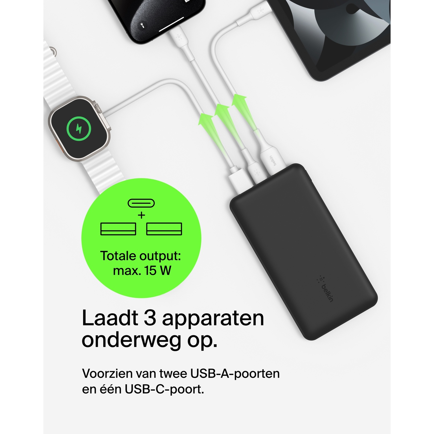 Black power bank charging three devices. Shows watch, phone, and tablet. Green arrows.