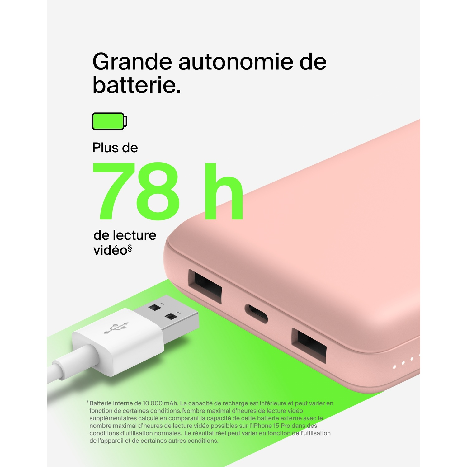 Une batterie externe rose avec câble de chargement et texte sur fond blanc avec un téléphone.