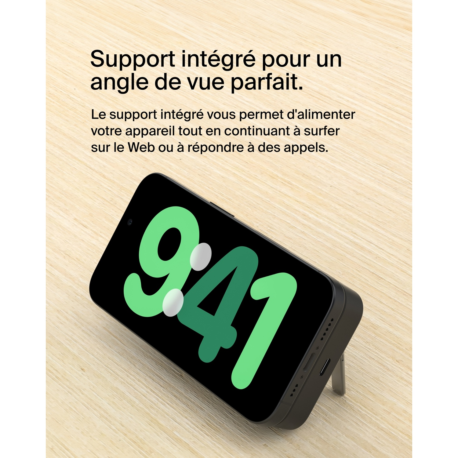 Un téléphone posé, affichant l'heure 9:41. Le téléphone est sur une surface en bois.