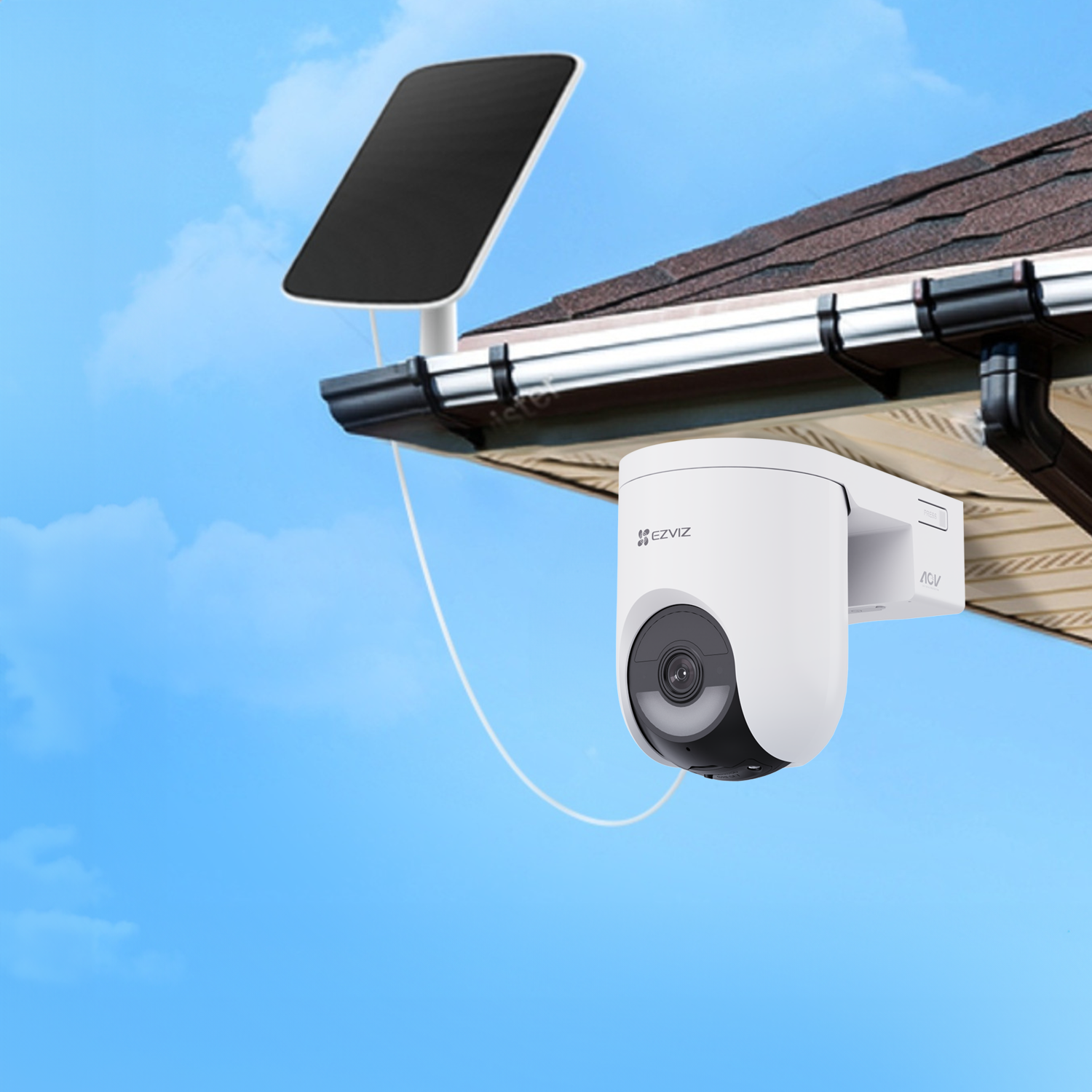 White security camera and black solar panel on a roof.