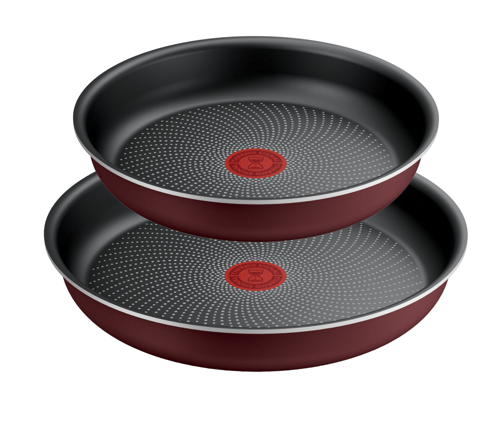 Dwie ułożone na sobie patelnie w kolorze bordowym. Każda ma ciemne wnętrze i czerwone logo pośrodku.