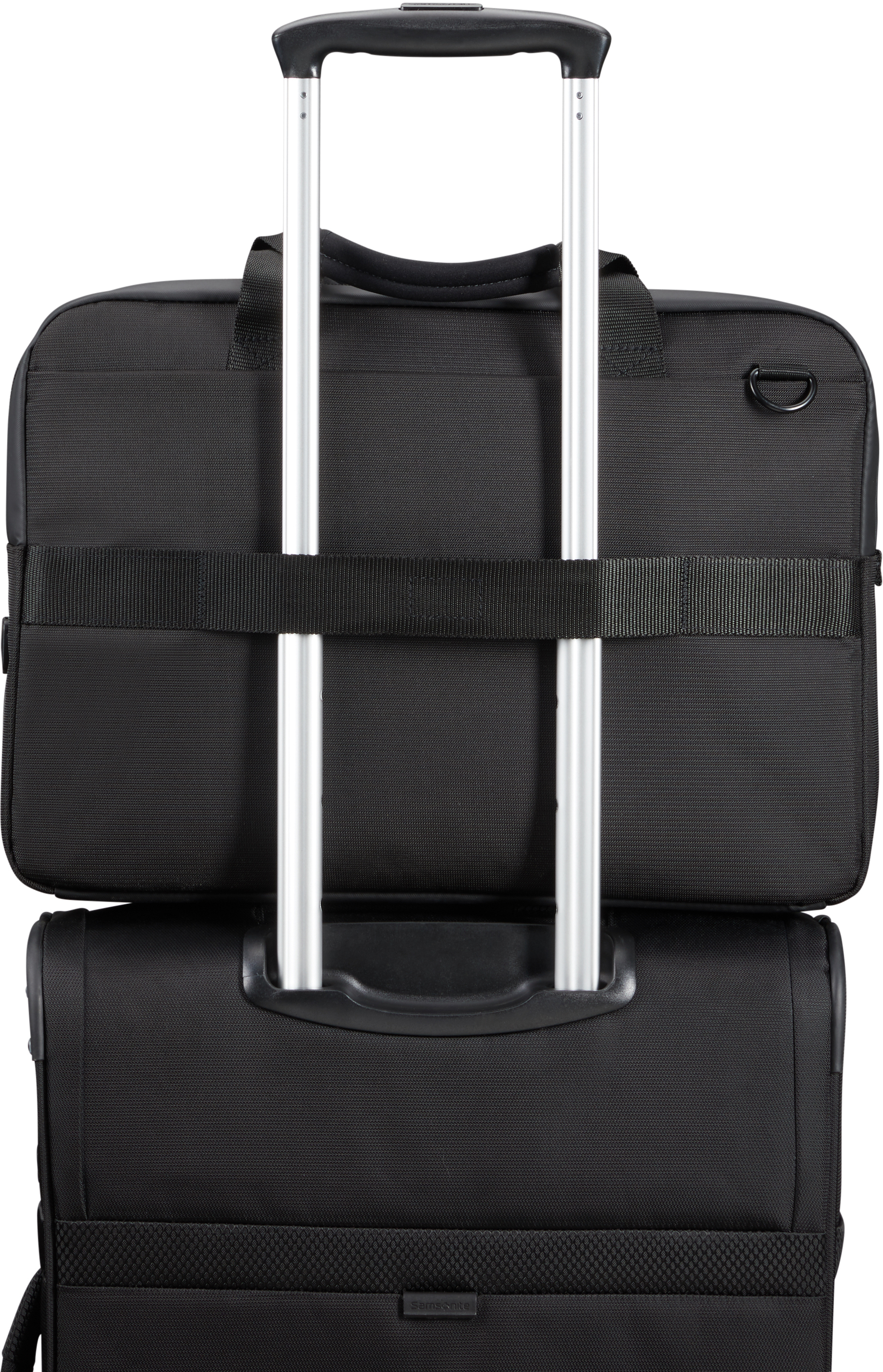 Nahaufnahme eines schwarzen und grauen Rollkoffers und einer passenden Tasche.