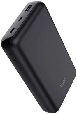 Fekete power bank portokkal és 'Trust' logóval, sötét felületen ferdén.