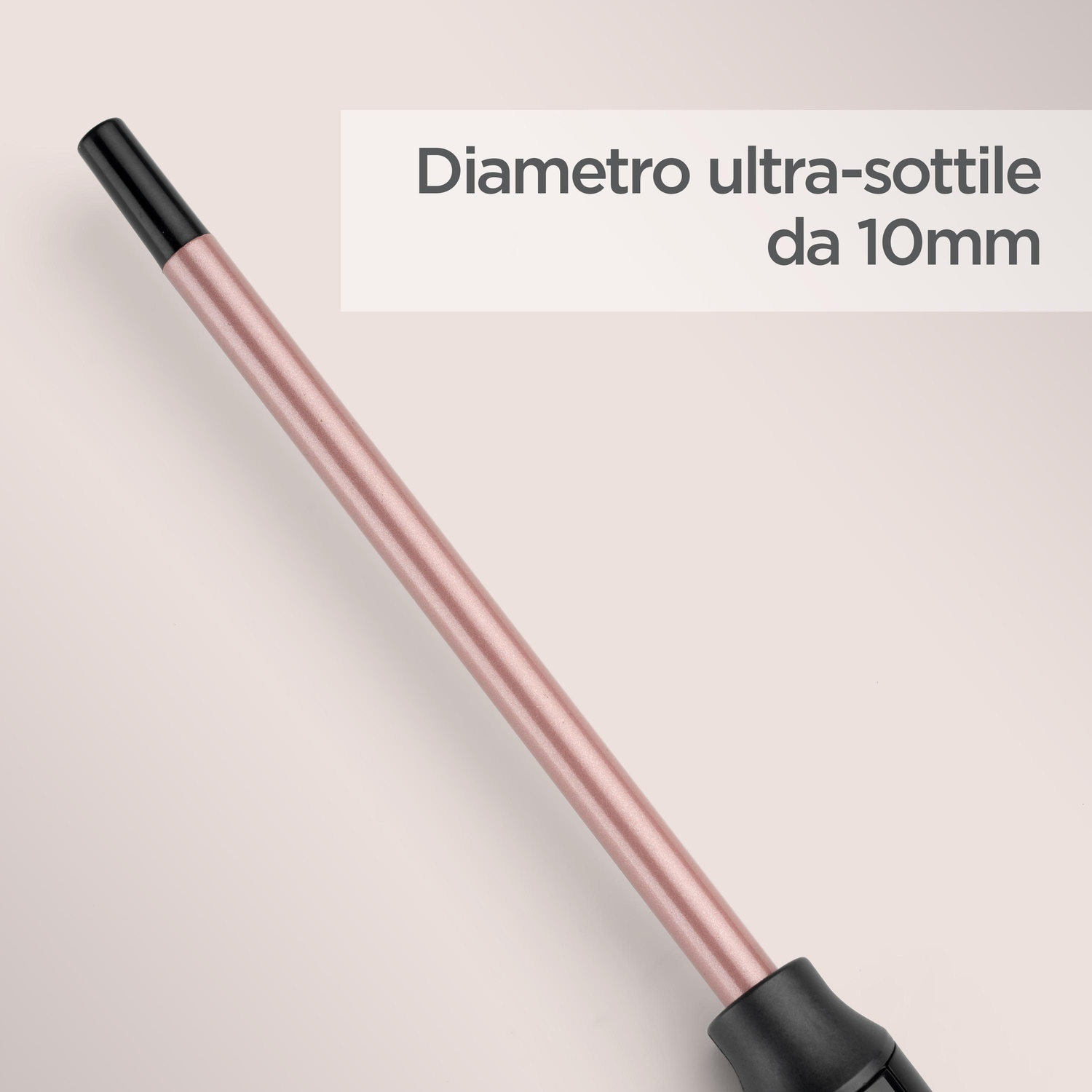 Arricciacapelli oro rosa con punta nera. Testo: Diametro ultra sottile di 10 mm.