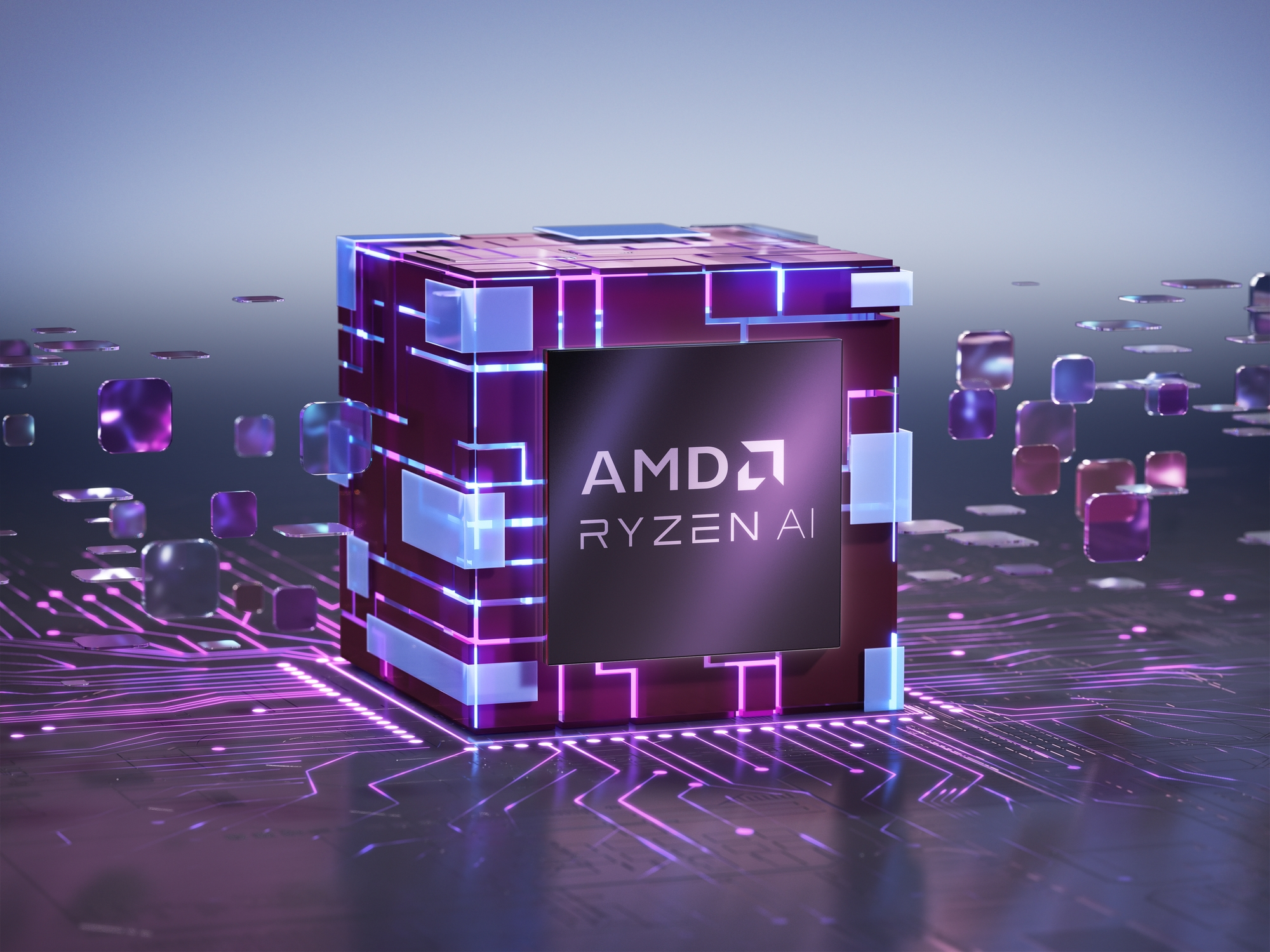 Siyah bir yüzeye ve parlayan ışıklara sahip küp şeklinde bir AMD Ryzen AI işlemcisi.