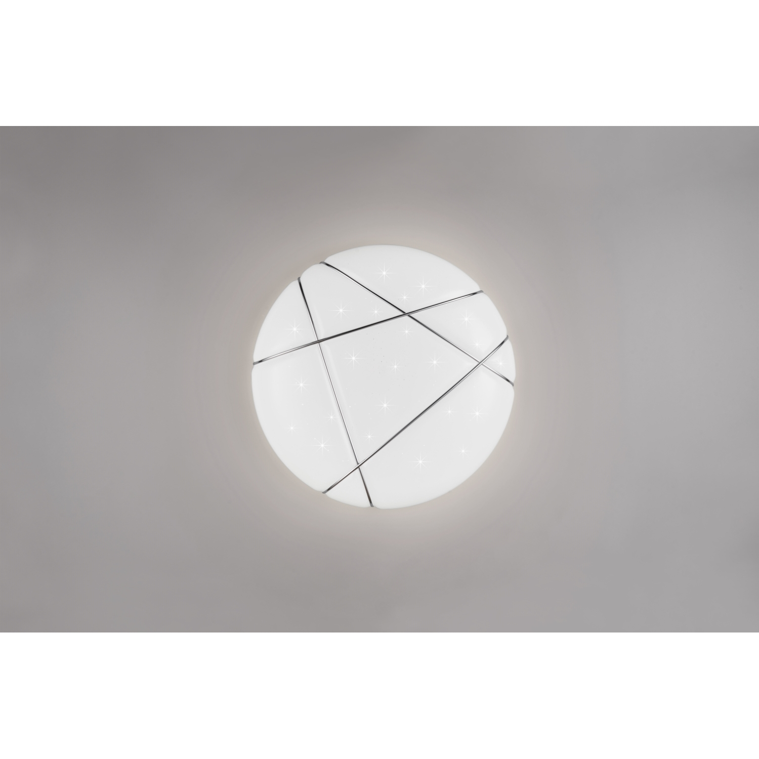 Lampada da soffitto. Forma rotonda con un design geometrico di linee intersecanti.