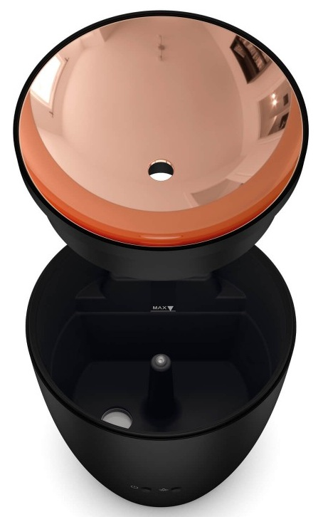 Czarna i miedziana fontanna dla zwierząt domowych. Góra miedziana, dół czarny.