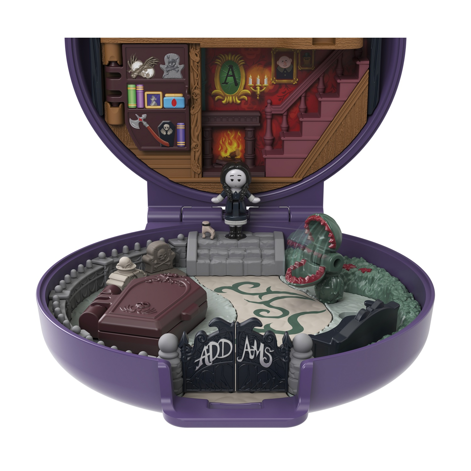 Un playset di Polly Pocket. Bambola in miniatura di fronte a una scena di casa infestata.