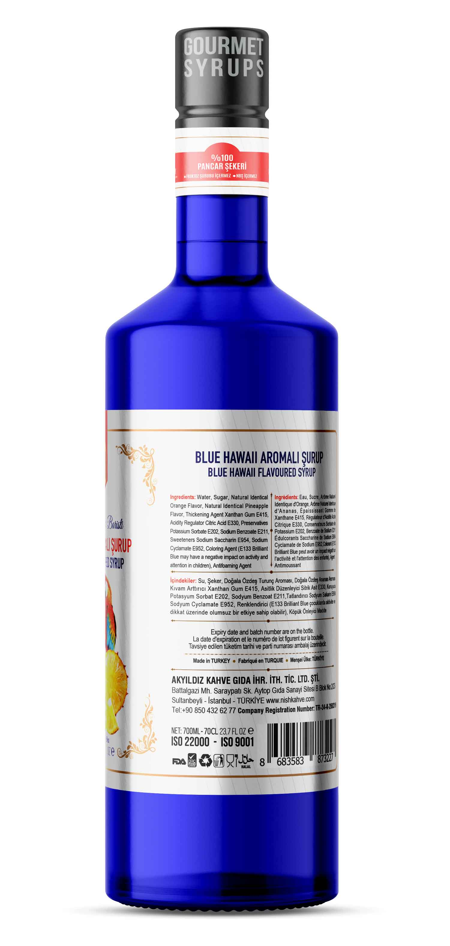 Mavi şurup şişesi. Etikette 'Blue Hawaii' yazıyor. Siyah kapak 'Gourmet Syrups' diyor.