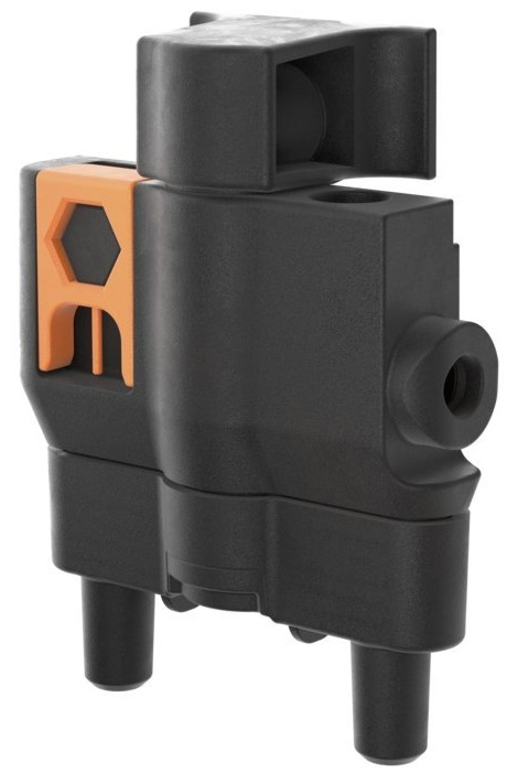 Czarny i pomarańczowy łącznik elektryczny, z sześciokątnym detalem z jednej strony.