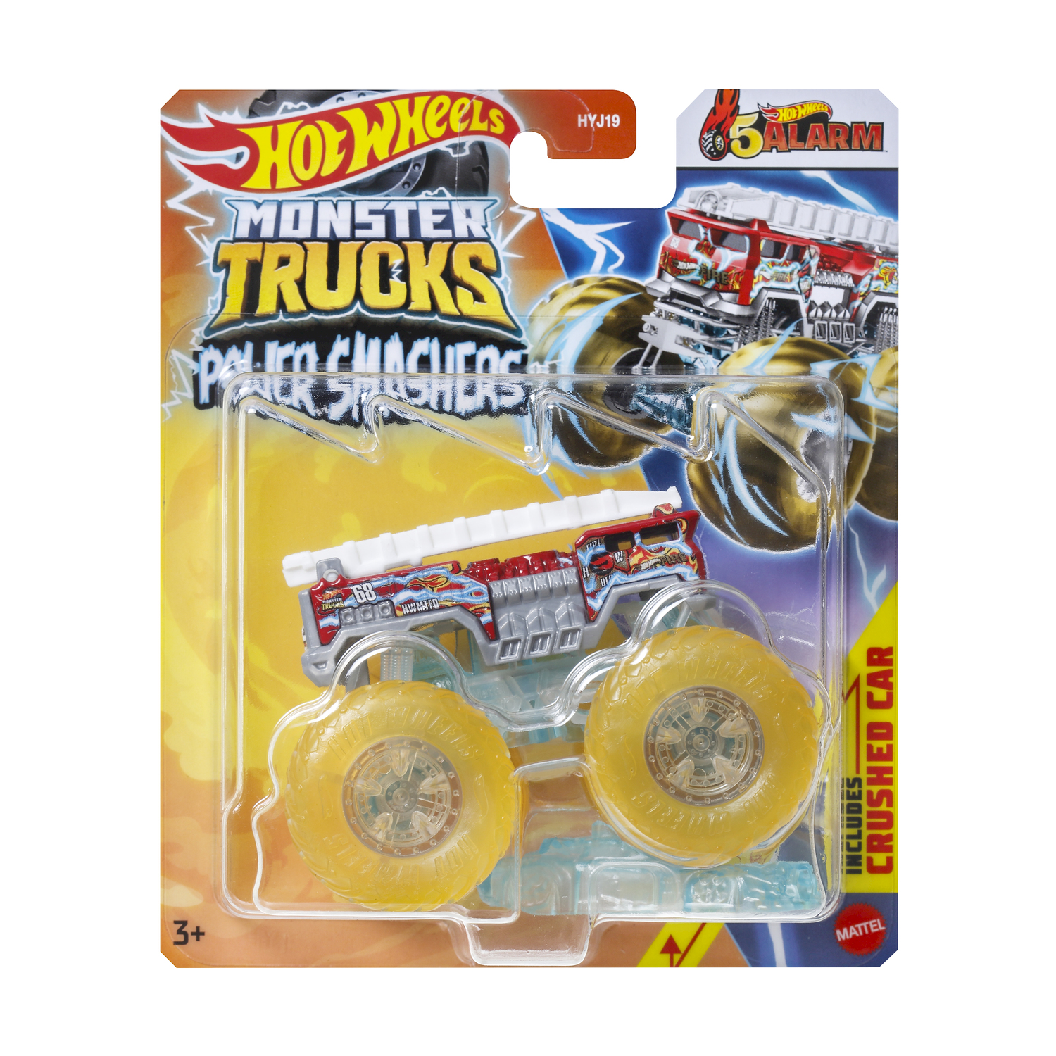 Un giocattolo Hot Wheels Monster Trucks nella sua confezione originale. Il giocattolo è un camion dei pompieri con grandi ruote gialle.