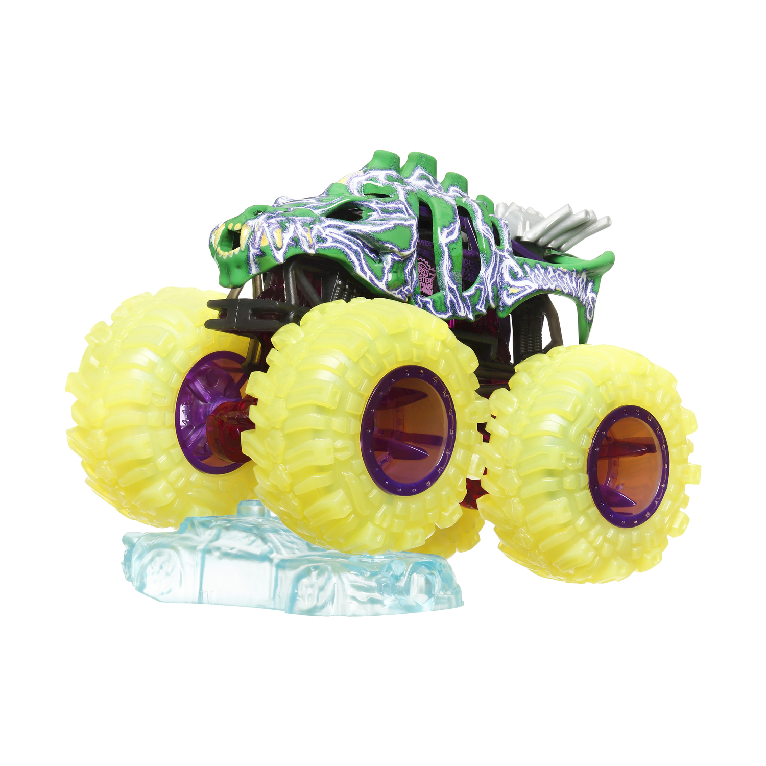 Camion mostro verde e viola giocattolo, con pneumatici gialli e base trasparente.