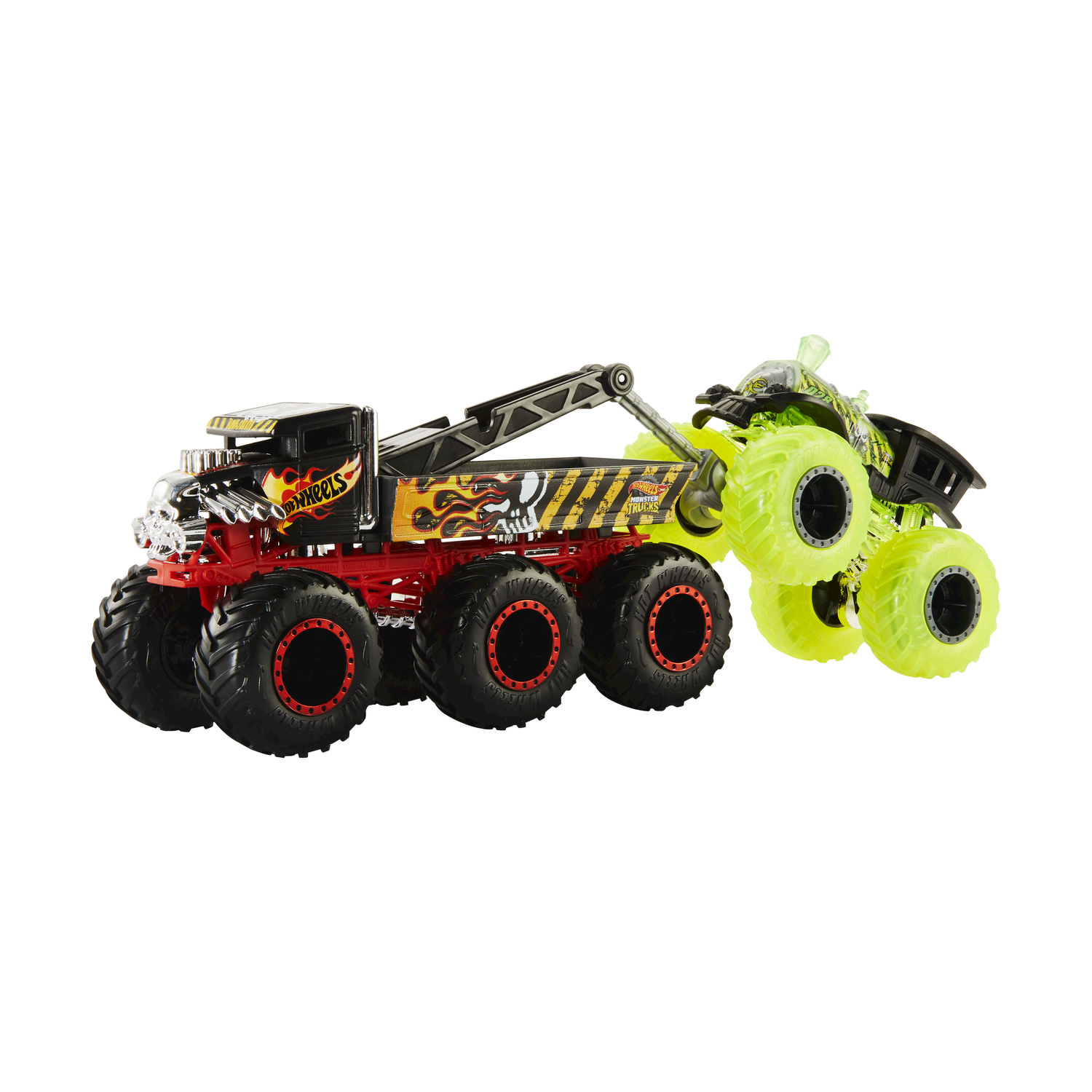 Un monster truck Hot Wheels rosso e nero che tira un monster truck verde neon.