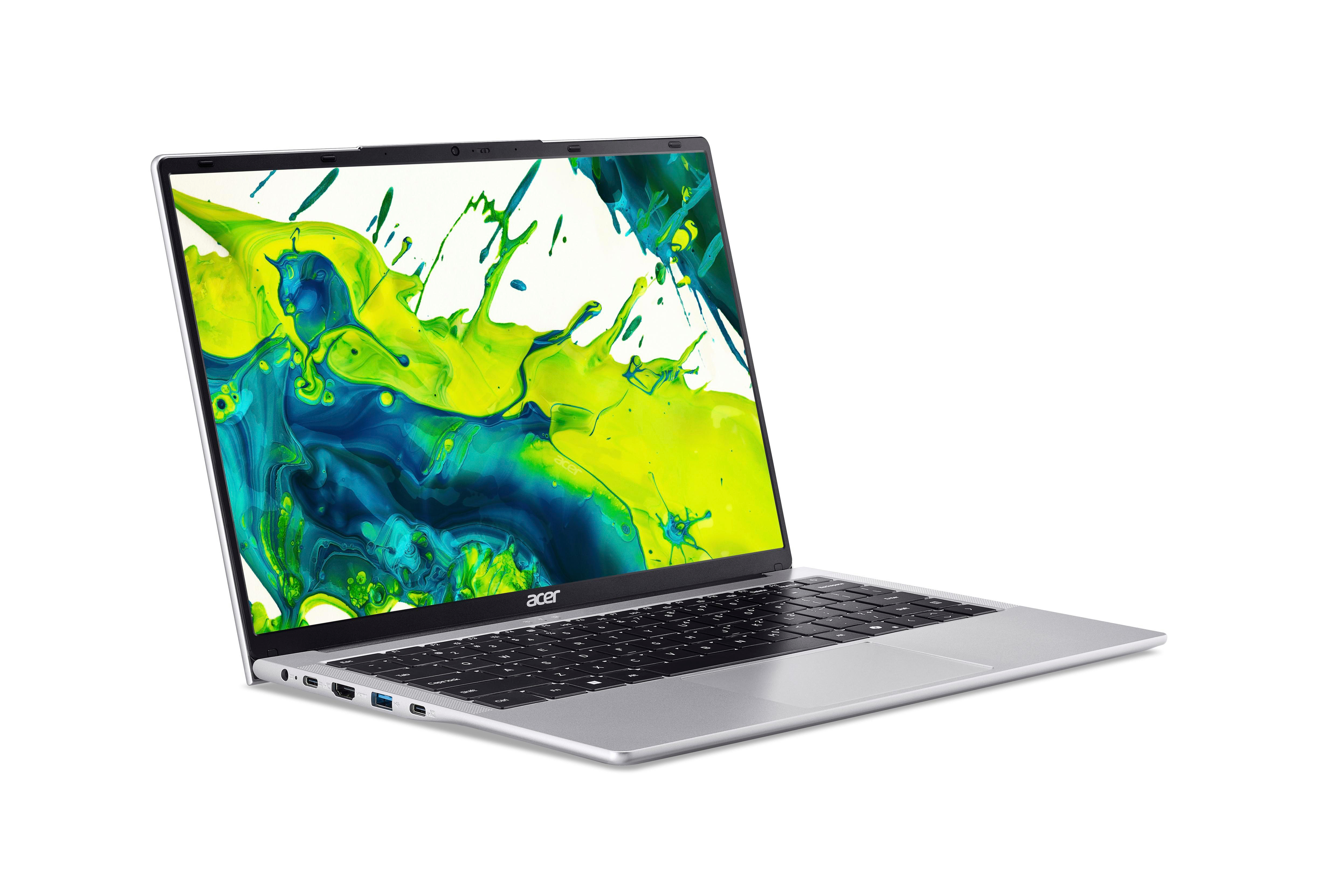 Ein silberner Laptop mit Tastatur, offen auf weißem Hintergrund. Der Bildschirm zeigt Farbspritzer.