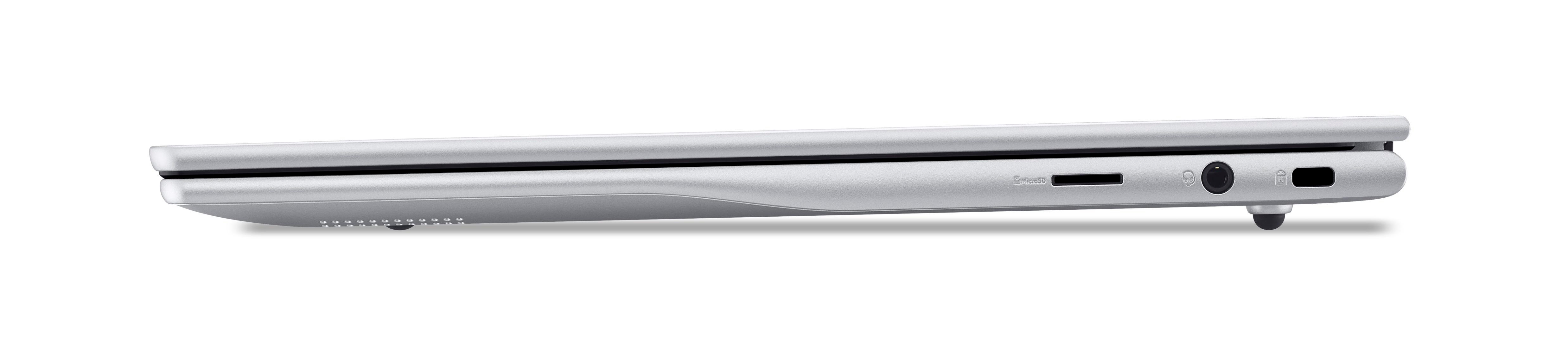 Seitenansicht eines silbernen Laptops. Anschlüsse sind an der Seite sichtbar.