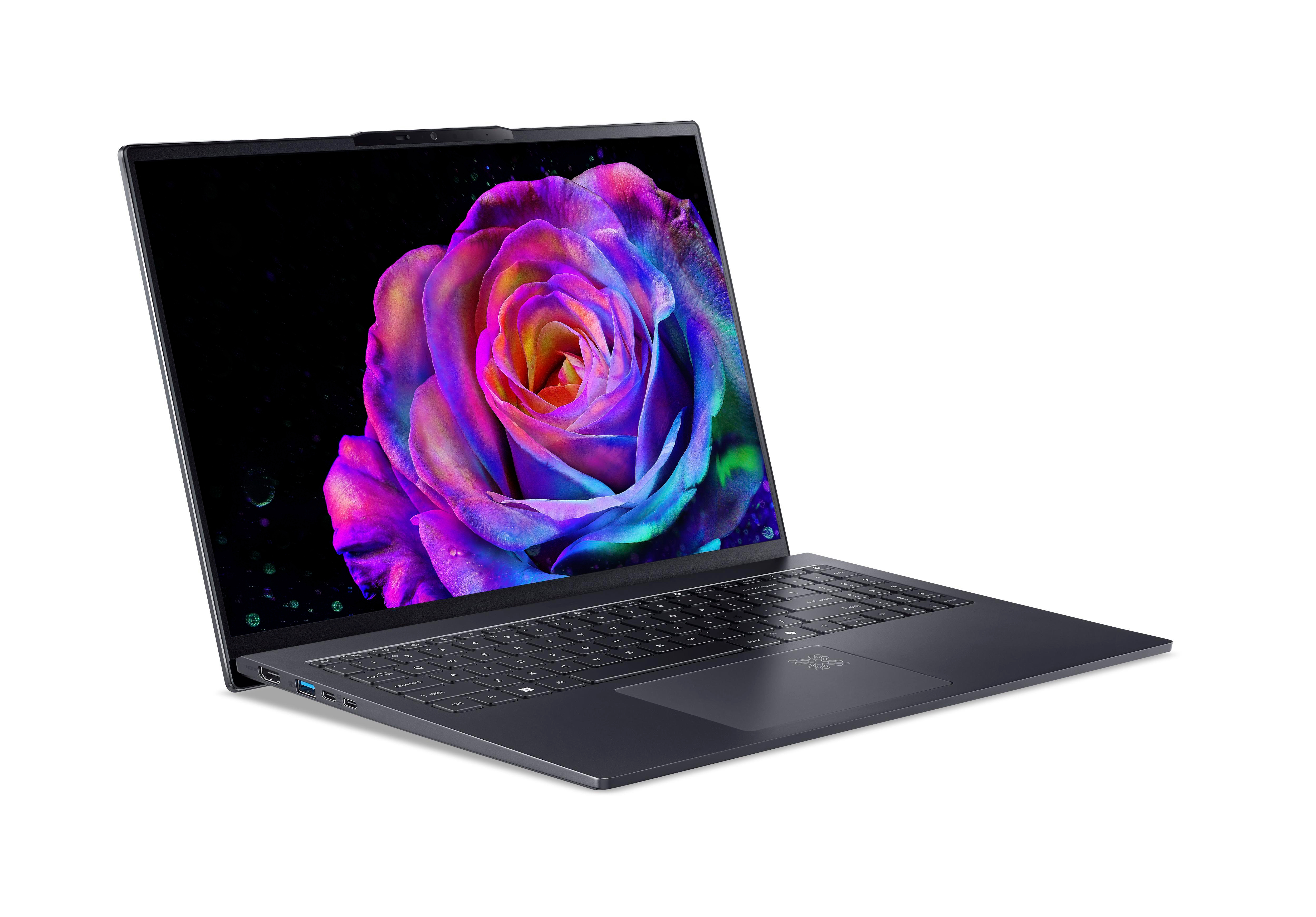 Ein blauer Laptop mit einer bunten Rose auf dem Bildschirm, zur Seite geneigt.