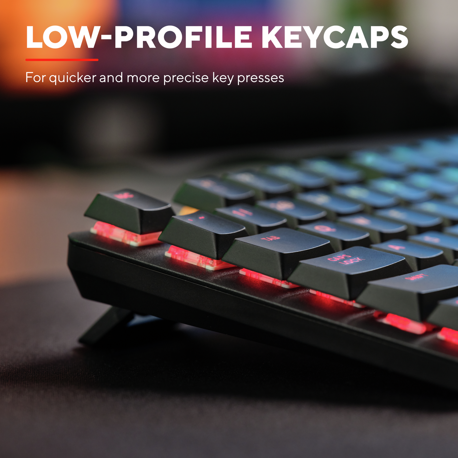 Close-up of keyboard keys with red lighting beneath. Text reads 'LOW-PROFILE KEYCAPS'.