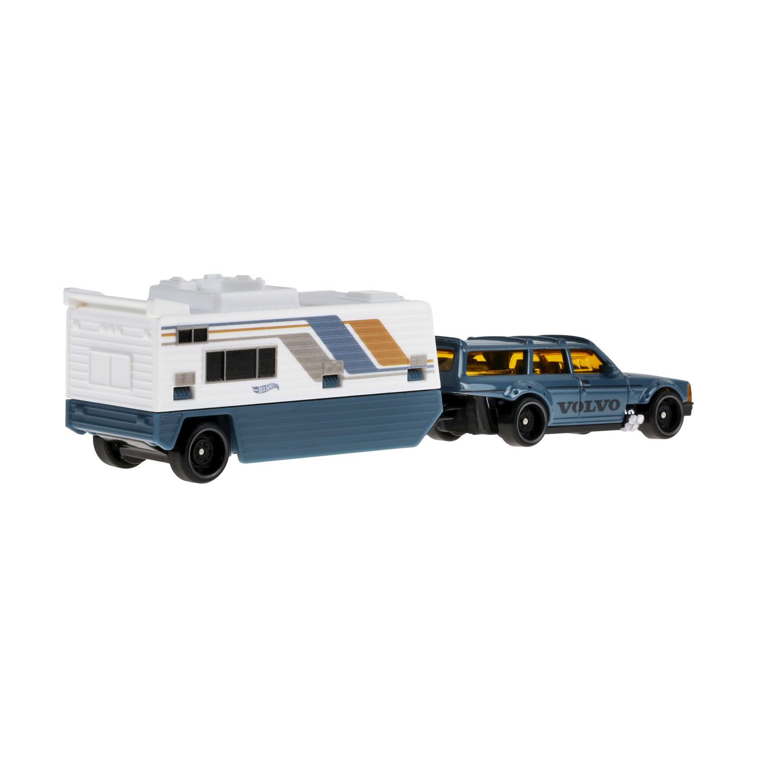 Auto Volvo blu che traina un rimorchio camper bianco e blu.