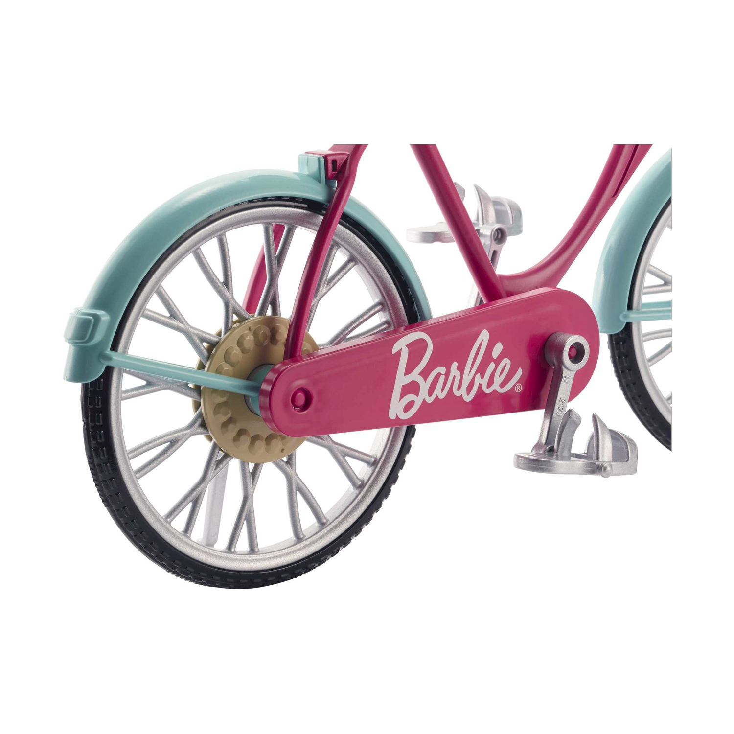Primo piano della ruota, del telaio rosa e del parafango blu di una bici Barbie.