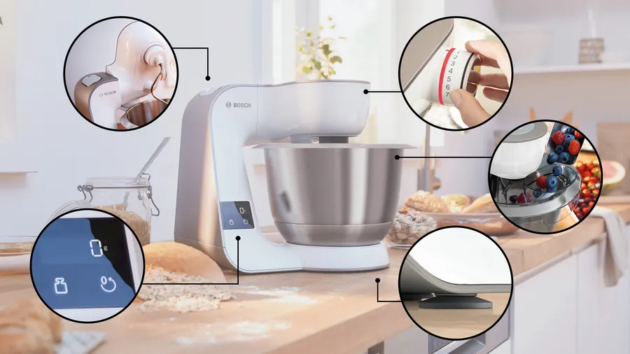 Une machine de cuisine blanche avec des vues rapprochées de ses fonctions.