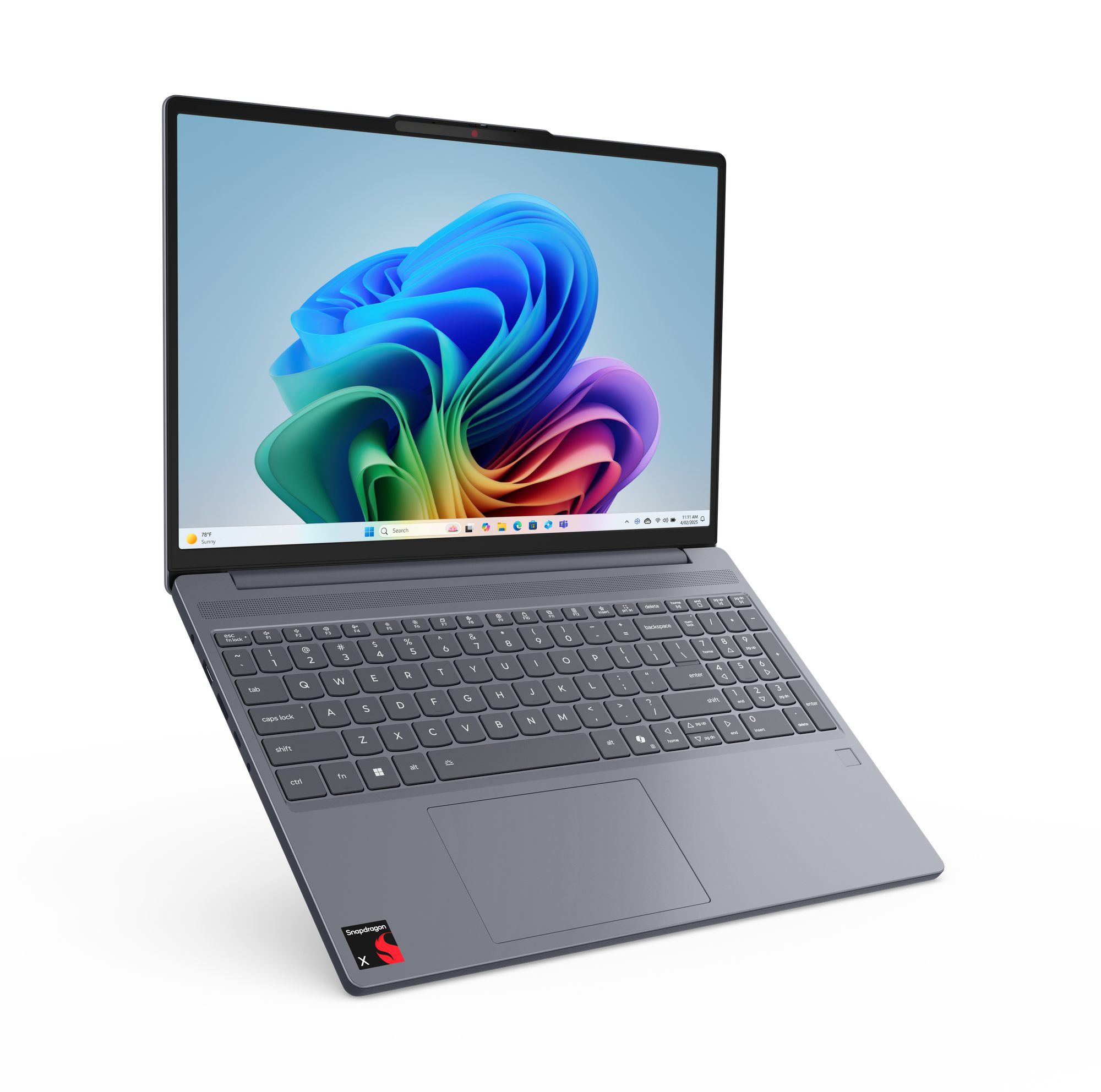 Ein grauer Laptop mit farbenfroher Bildschirmanzeige, der auf einer weißen Oberfläche steht.
