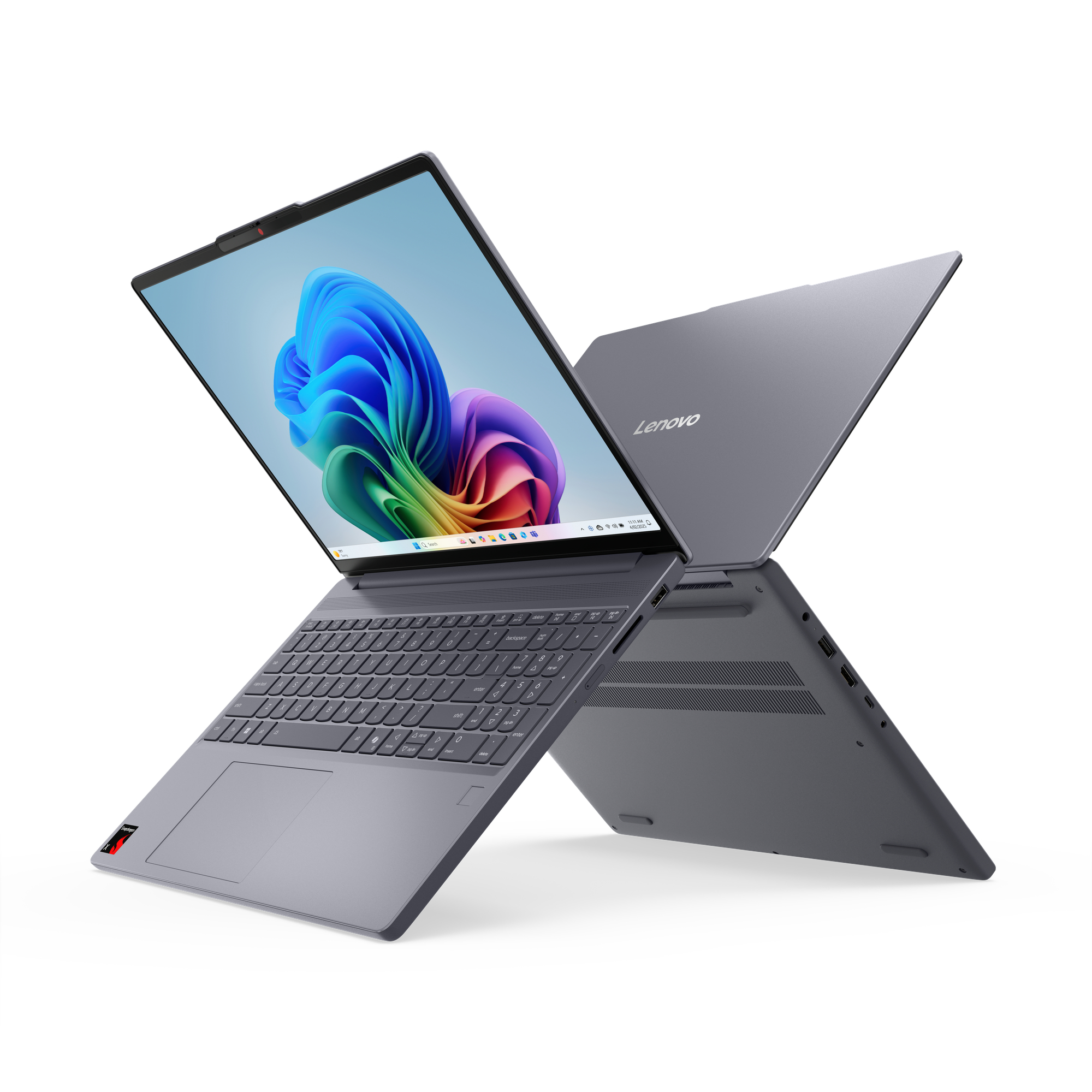 Grauer Laptop mit geöffnetem Bildschirm, farbenfroher Anzeige und Lenovo-Logo.