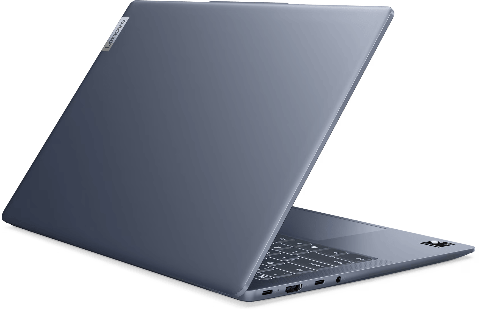 Kék laptop Lenovo logóval. Fekete felületen, oldalnézet.