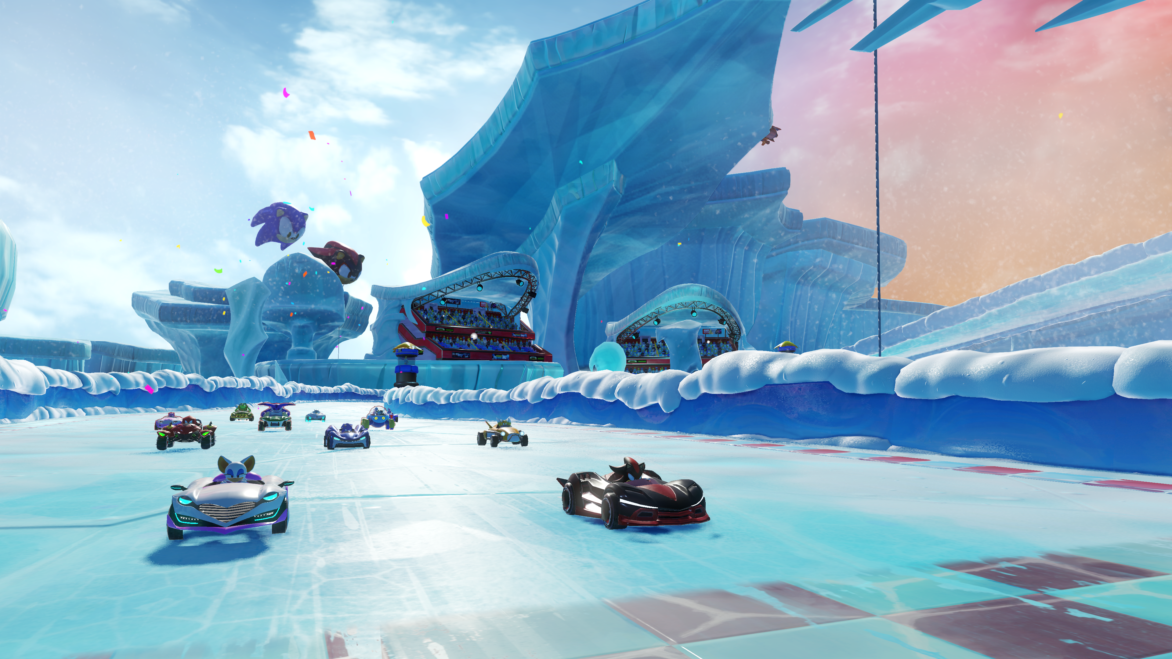 Voitures de course sur une piste glacée avec spectateurs et formations de glace.