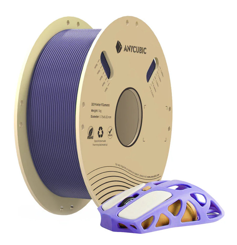 Szpula fioletowego filamentu do drukarki 3D i fioletowo-złoty uchwyt na mysz.