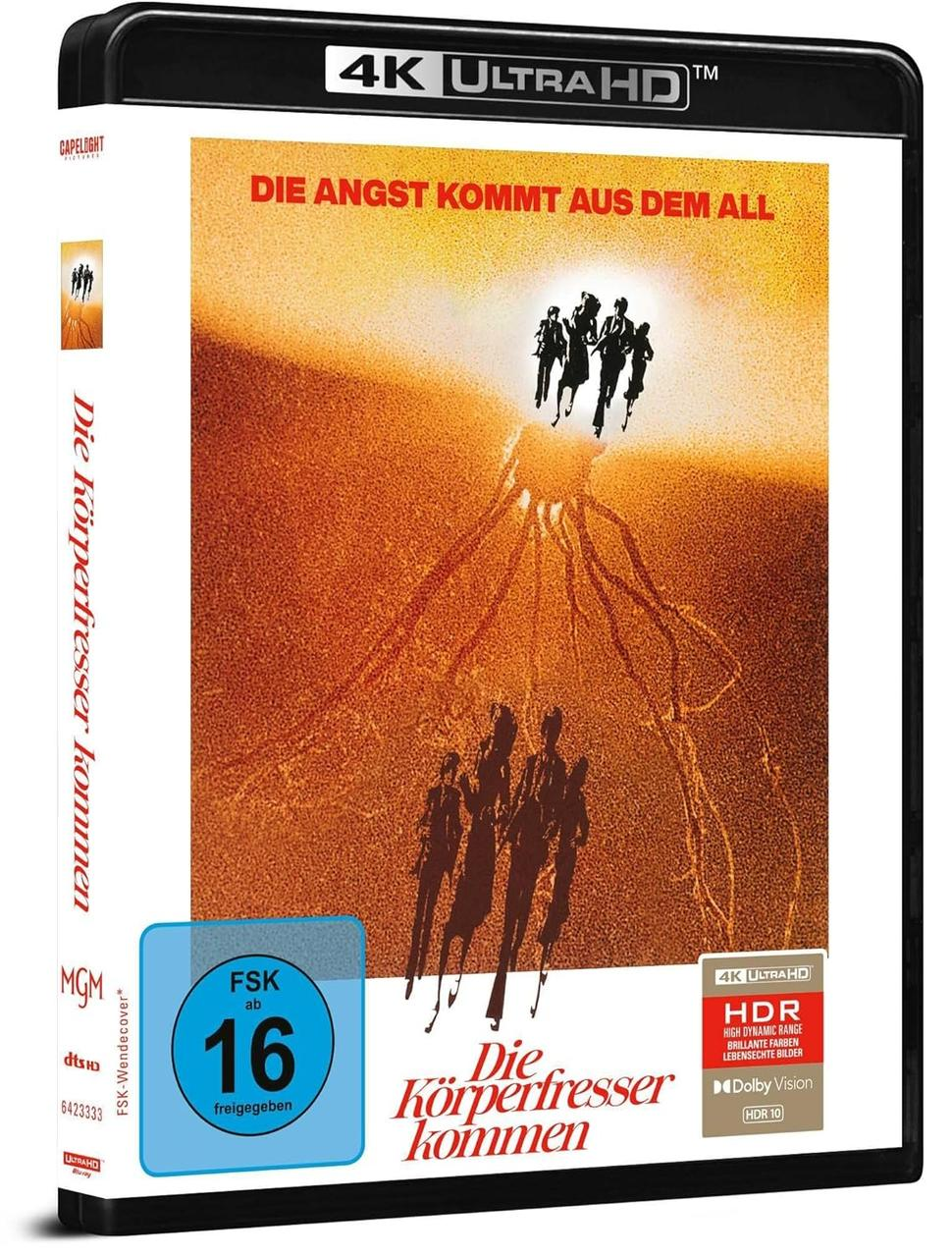 Filmcover: Die Körperfresser kommen. Schwarzer Koffer. Leute rennen vor etwas weg.