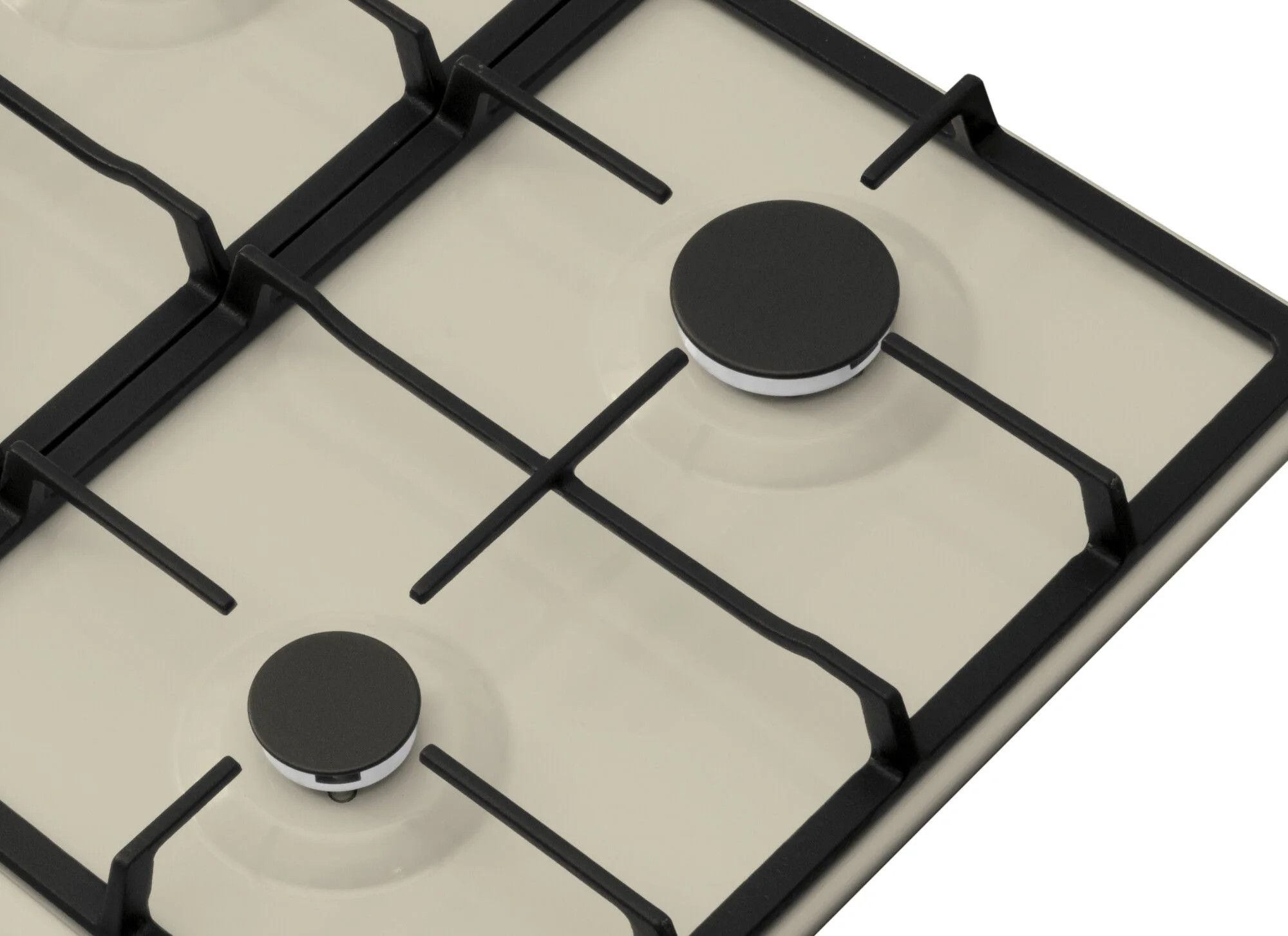 Zbliżenie kremowego blatu kuchenki gazowej z czarnymi kratkami i nakładkami na palniki. Widoczne są dwa palniki.