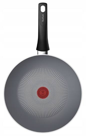 Patelnia Tefal, widok z góry, szare wnętrze, czarny uchwyt, czerwone kółko pośrodku.