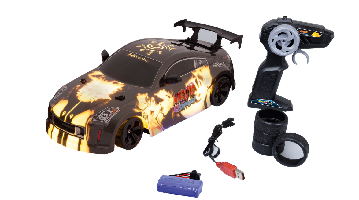 Ein schwarz-gelbes Spielzeugauto mit Fernbedienung und Ersatzreifen. Auto hat Grafiken und Lichter.