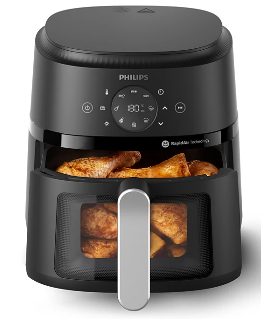 Czarna frytkownica beztłuszczowa Philips z widocznym jedzeniem w środku. Wyświetlacz cyfrowy z ustawieniem temperatury.