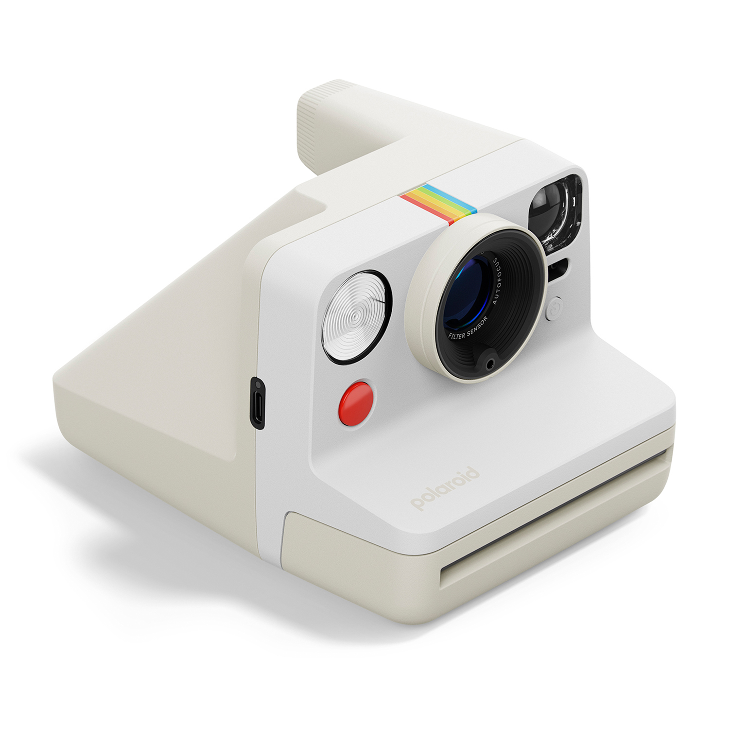Fotocamera Polaroid bianca con una striscia arcobaleno e un pulsante rosso. Ha un obiettivo e un flash.